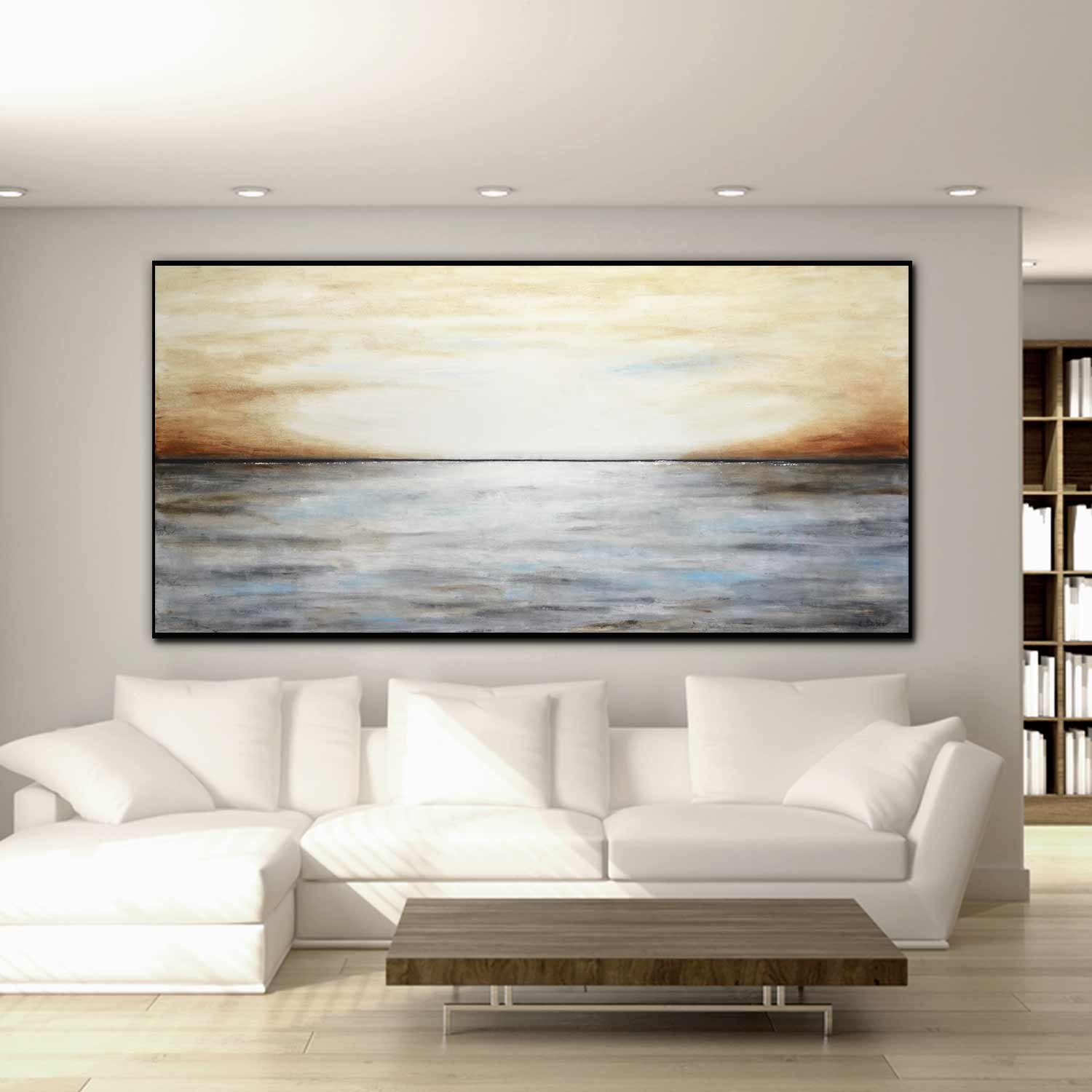 Abstract painting on a wall above a white sofa in a modern living room.