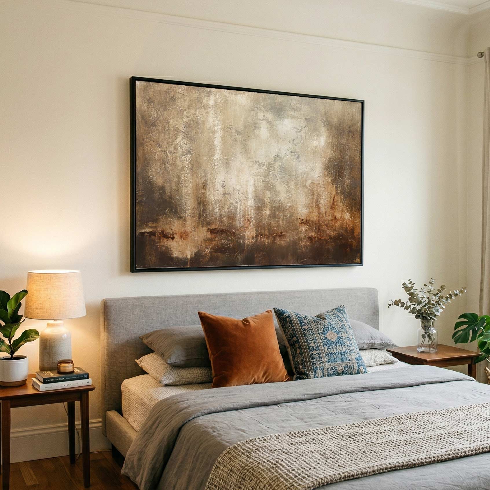 warm brown artwork above bed