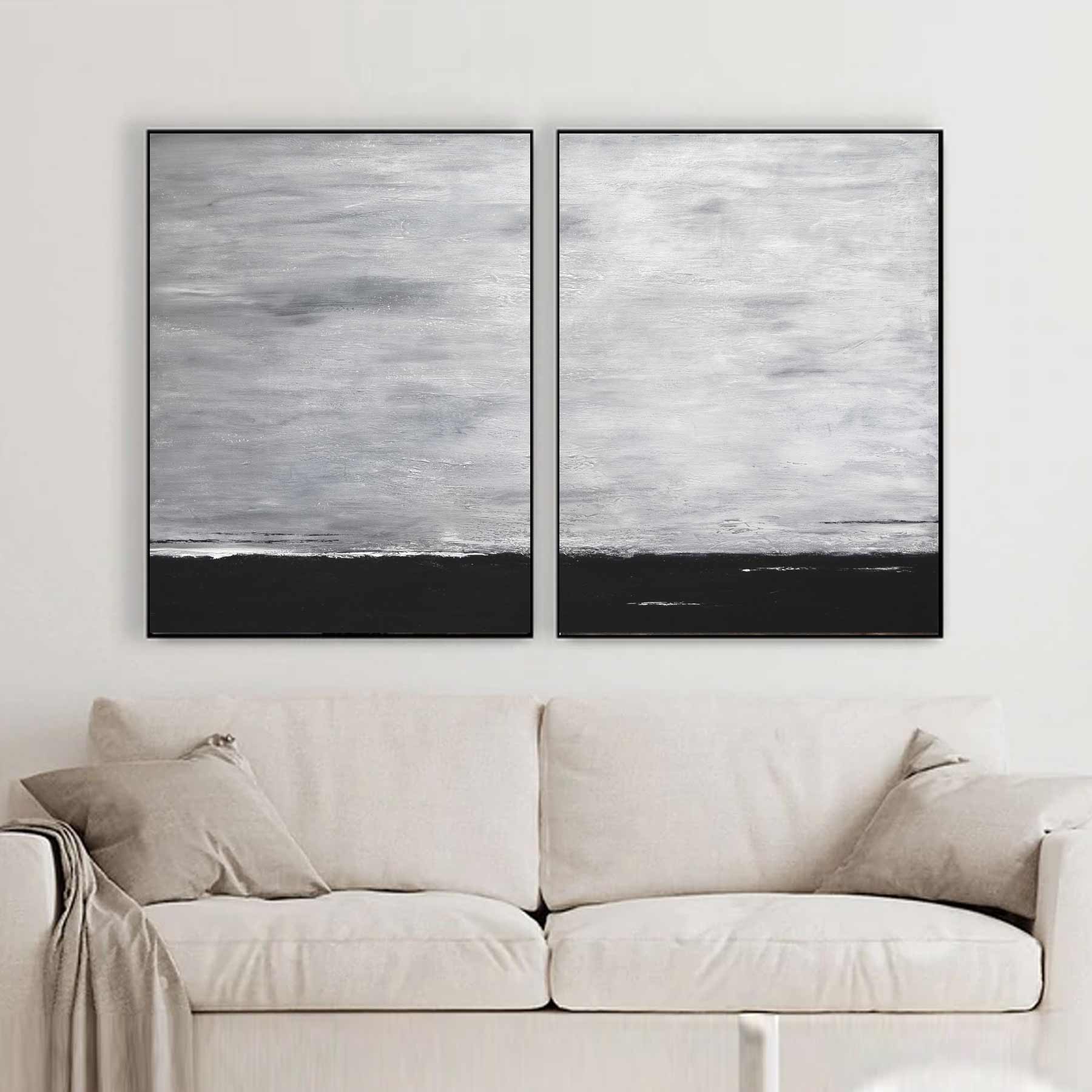 diptych artwork black white above sofa