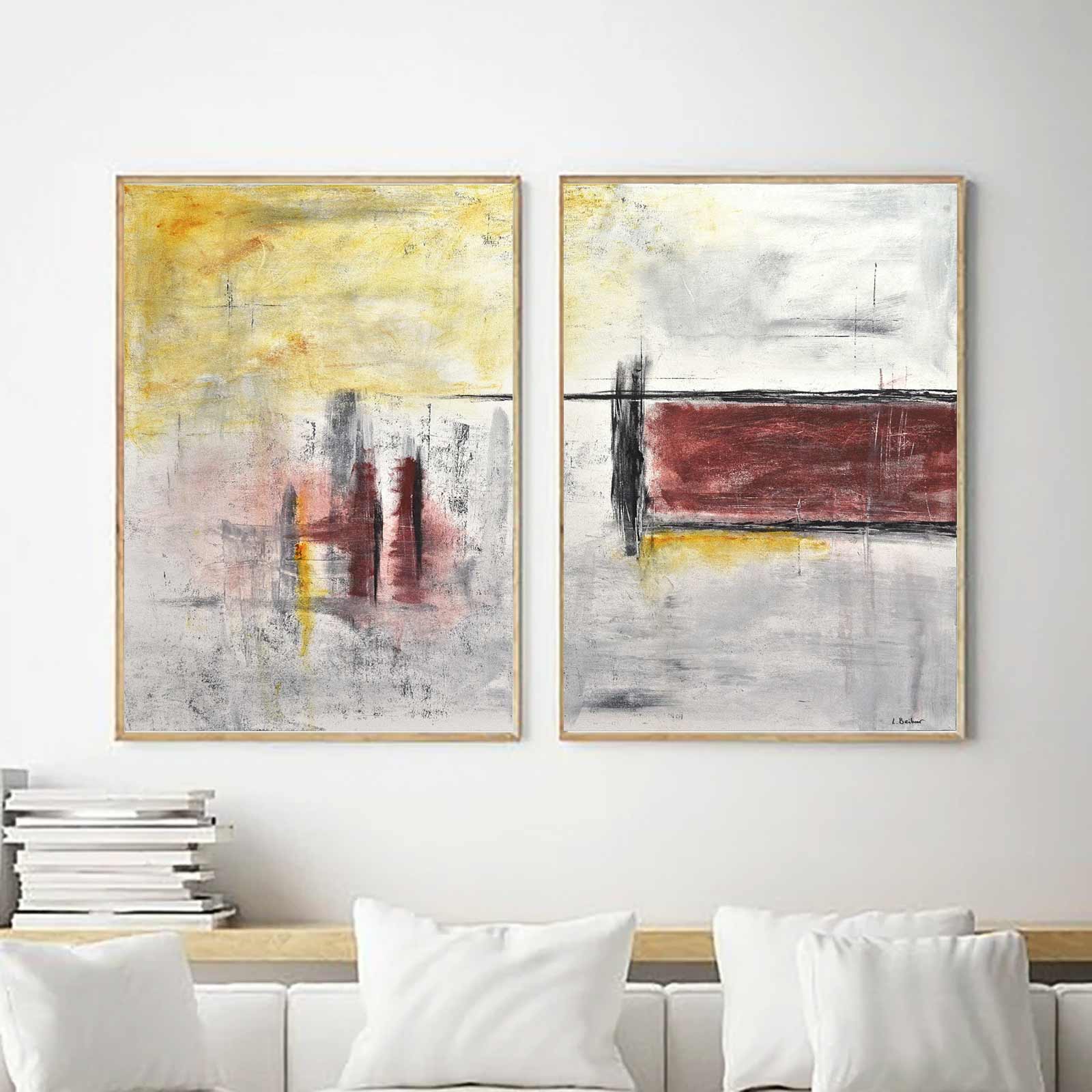diptych art on canvas above sofa