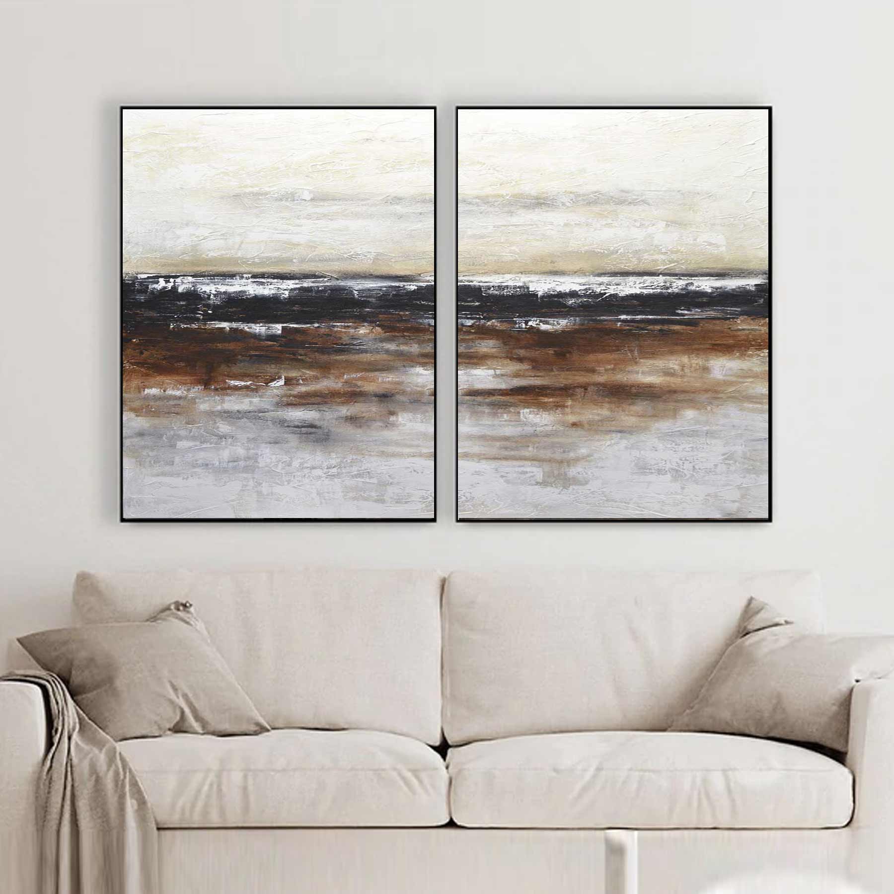 textured paintings above couch
