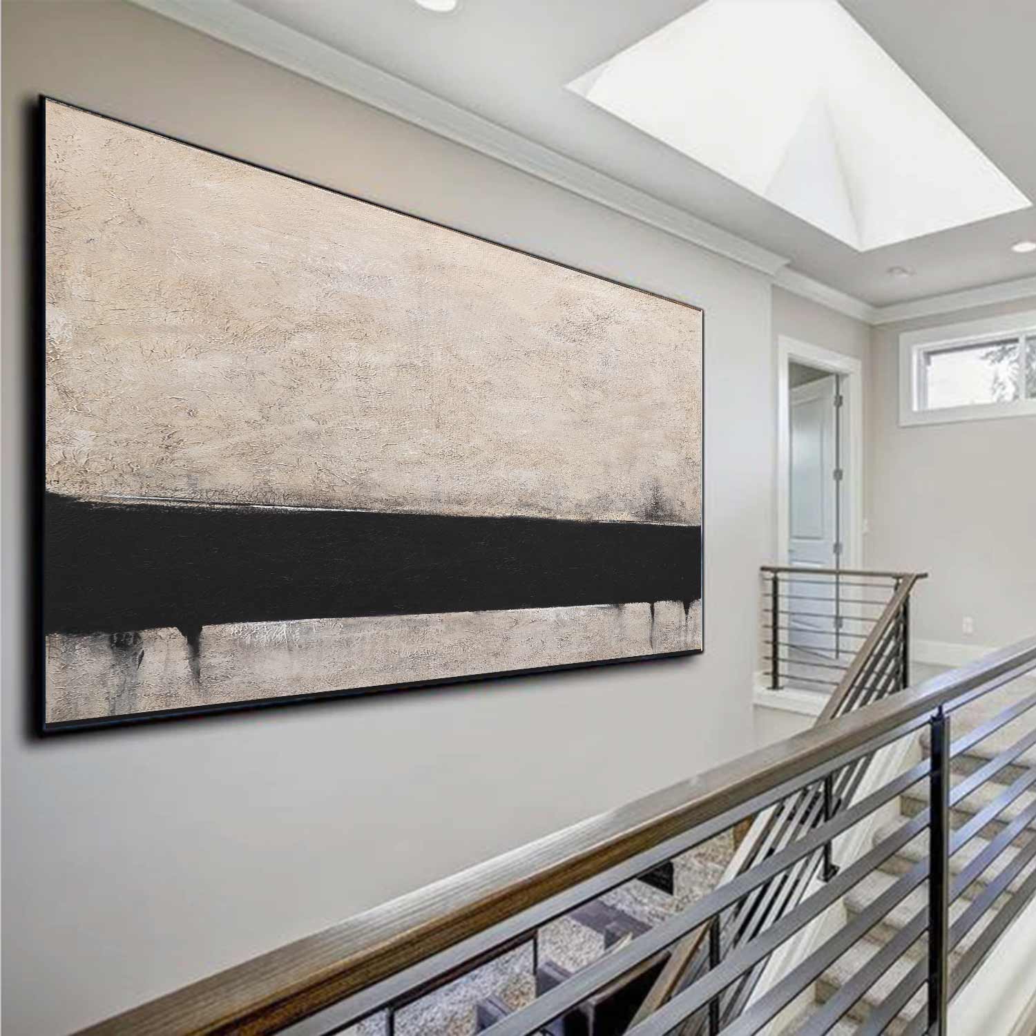 Abstract art piece on a wall in a modern interior setting