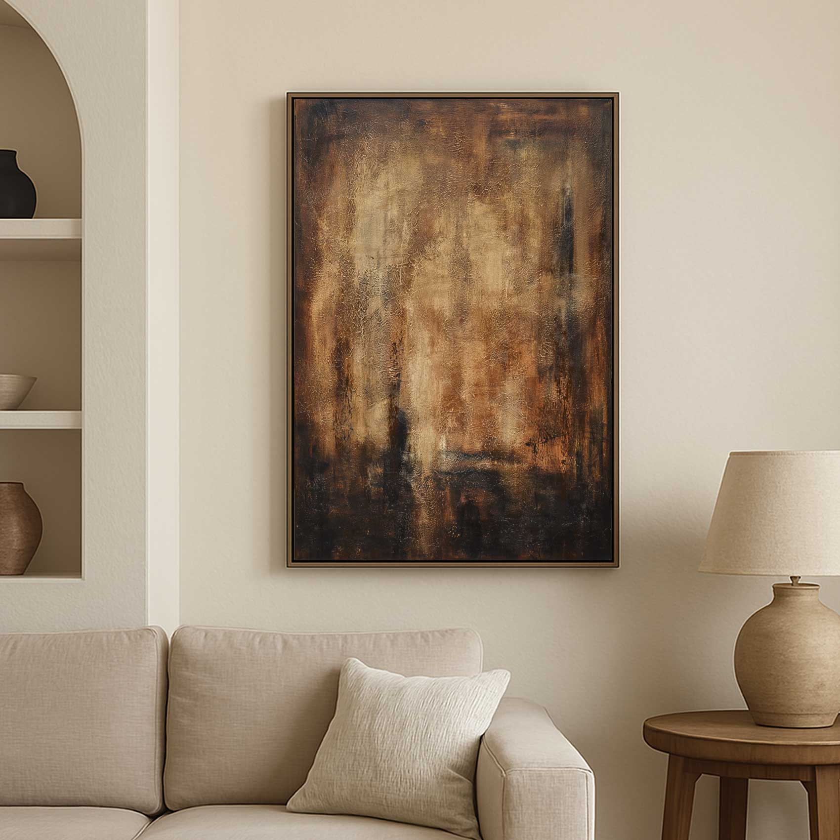 Abstract painting on a wall above a sofa in a living room setting