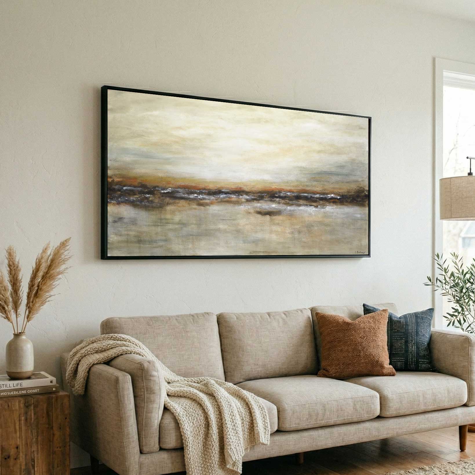art above couch warm colors