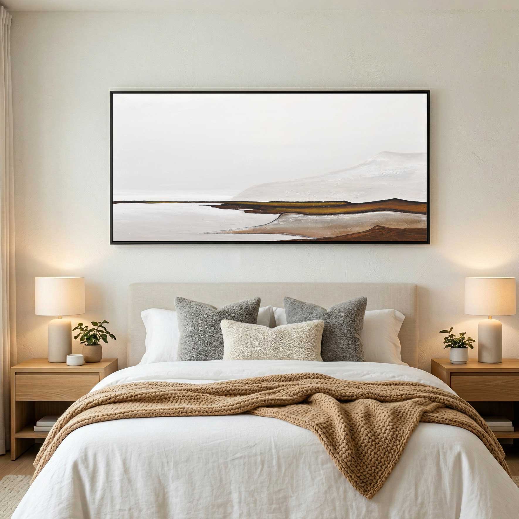 mountain landscape painting above bed