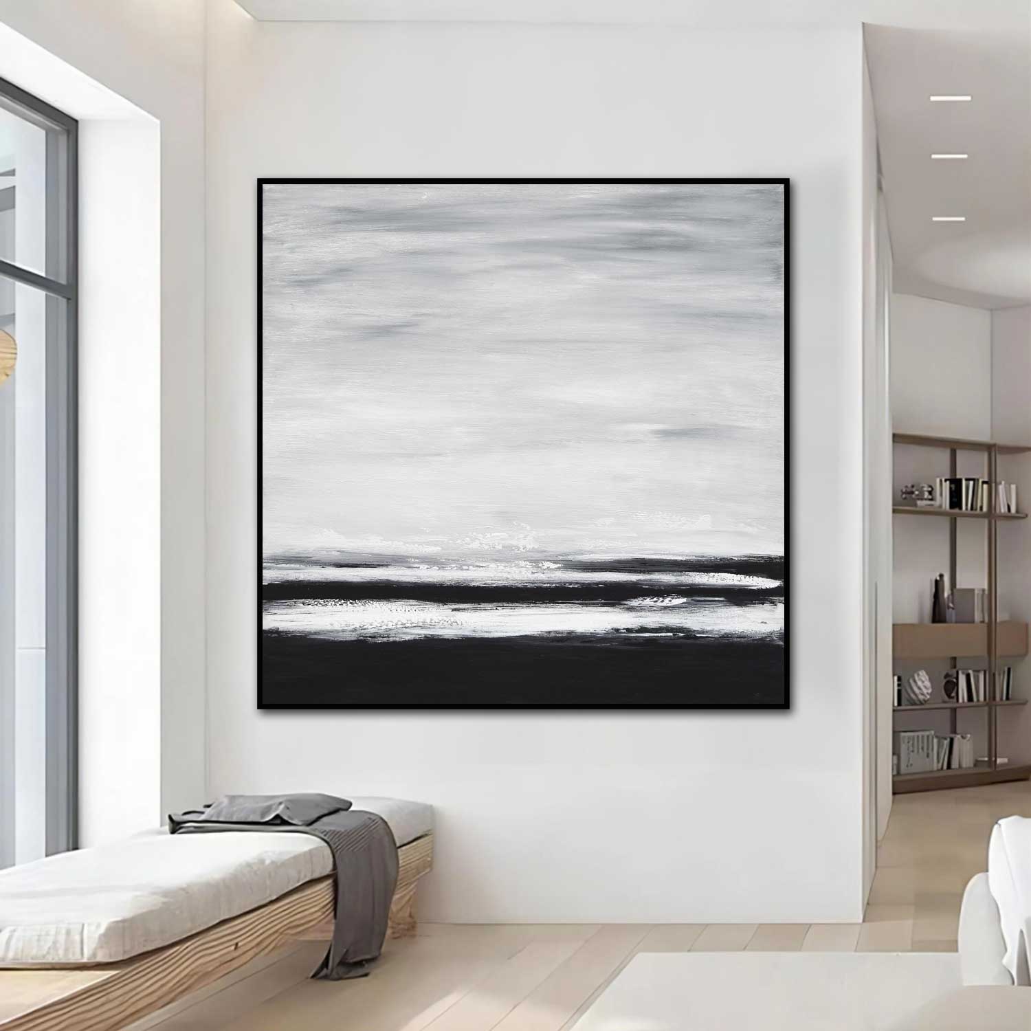 Abstract black and white painting in a modern living room.