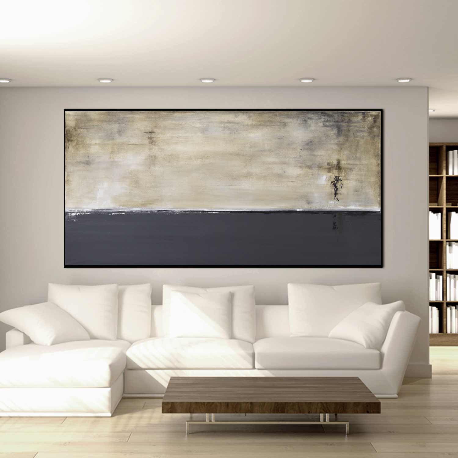 Modern living room with a white sofa and abstract painting on the wall.
