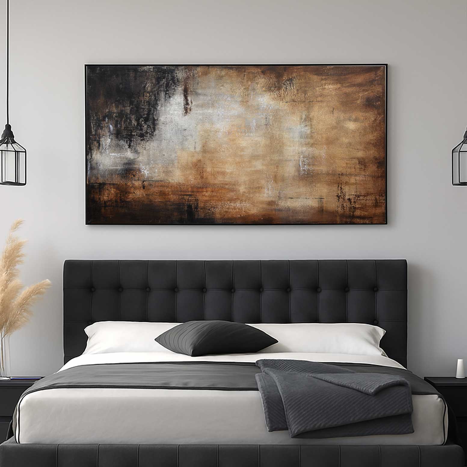 Modern bedroom with a black upholstered bed and abstract art on the wall.