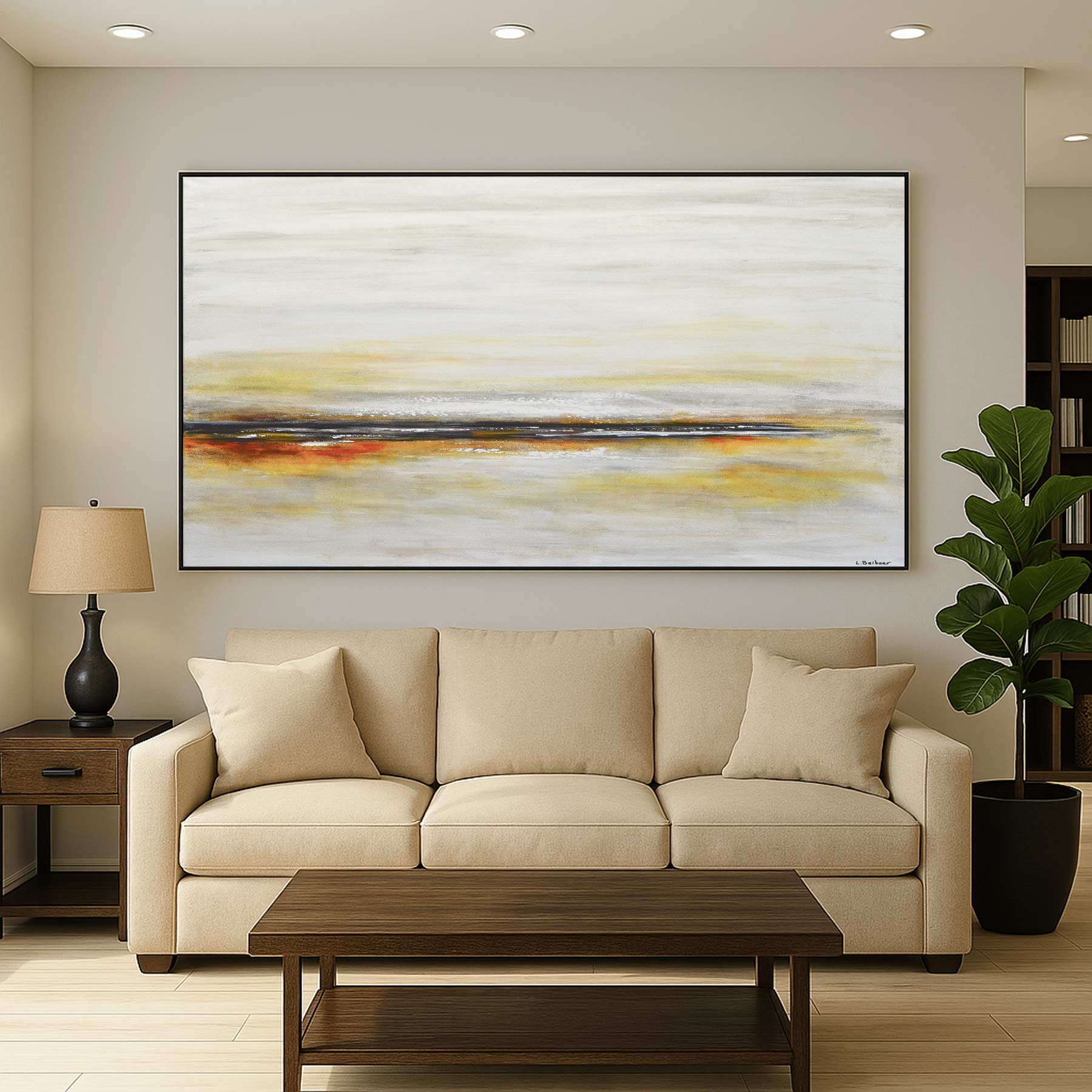 Beige sofa in a living room with a large abstract painting on the wall.