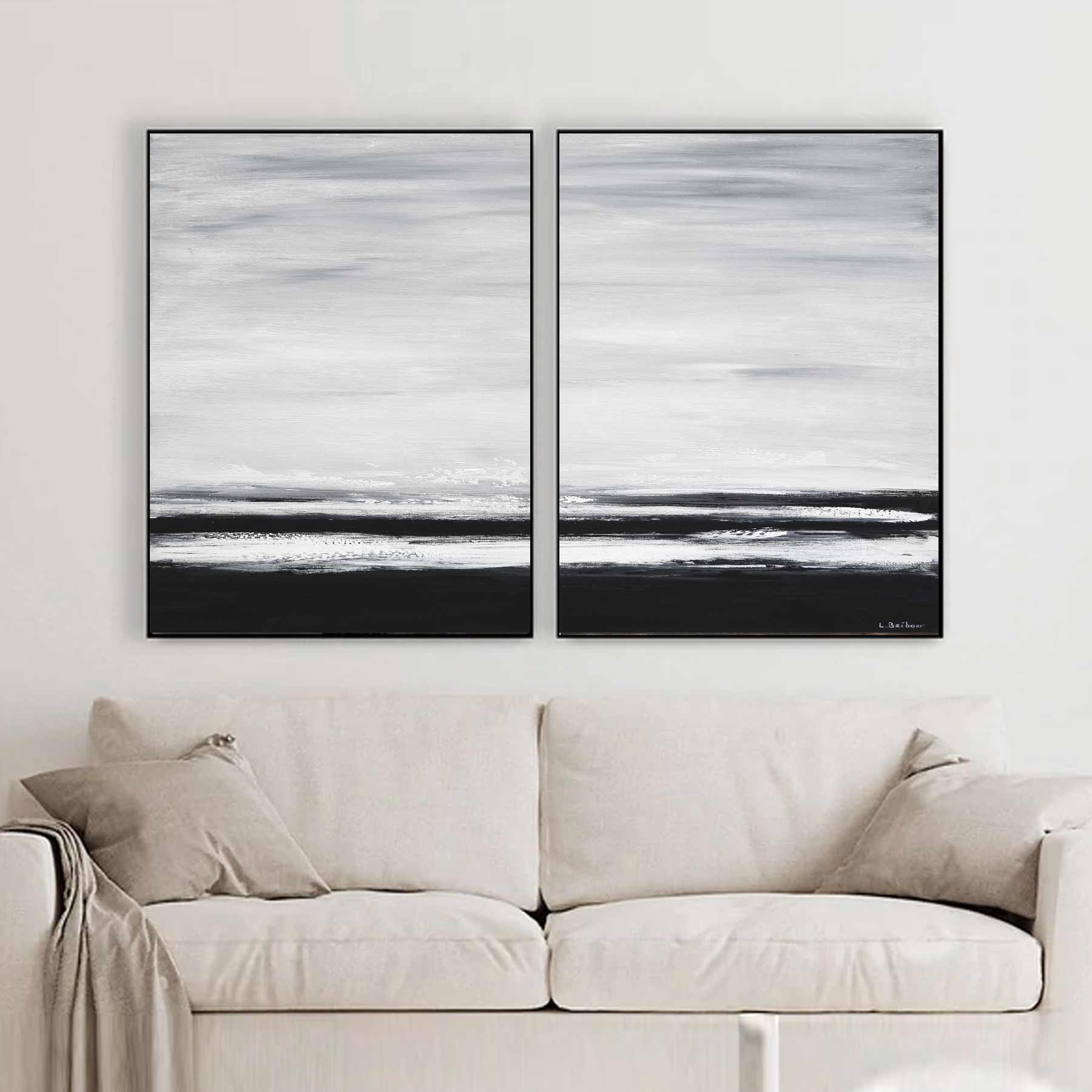 diptych seascape gray black above sofa