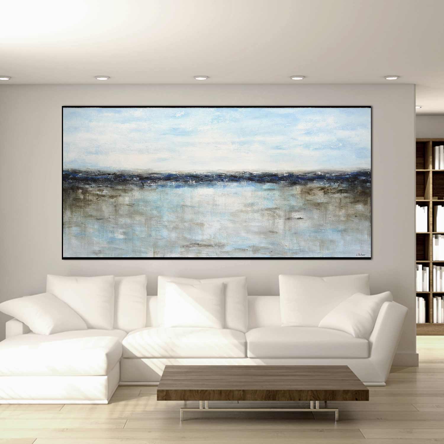 panoramic seascape painting above sofa