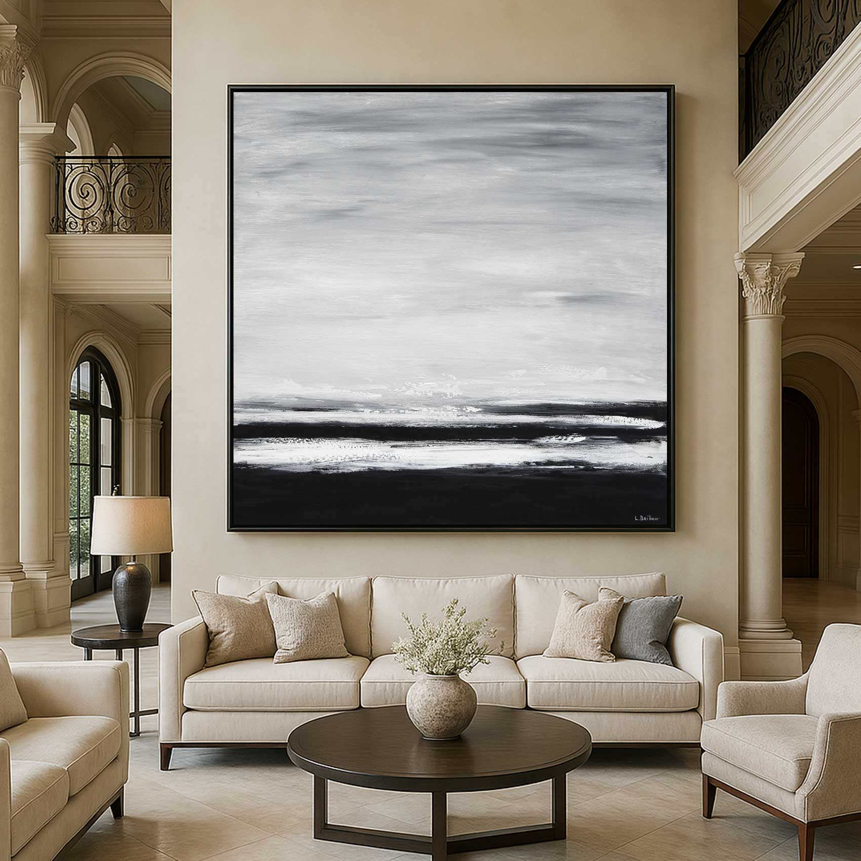 Living room with a large abstract painting on the wall, beige sofa, and decorative elements.